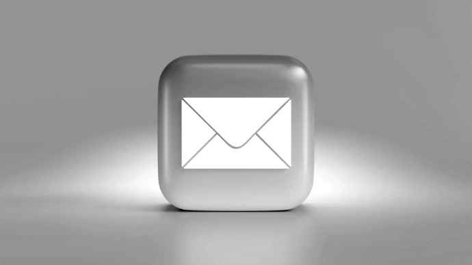 a blue button with a white envelope on it